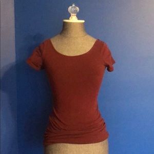 Tight maroon colored top